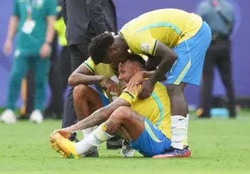 Soccer Football - FIFA World Cup 2026 - Round of 16 - Brazil v Norway - New York New Jersey Stadium, East Rutherford, New Jersey, U.S. - July 5, 2026
Brazil's Neymar, Raphinha and Vinicius Junior look dejected after the match as Brazil are eliminated from the World Cup IMAGN IMAGES via Reuters/James Lang