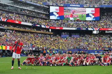 Soccer Football - FIFA World Cup 2026 - Round of 16 - Brazil v Norway - New York New Jersey Stadium, East Rutherford, New Jersey, U.S. - July 5, 2026
Norway's Erling Haaland with teammates celebrate after the match as Norway qualify for the quarter finals of the World Cup REUTERS/Dylan Martinez